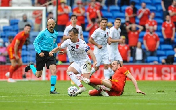 Wales Gareth Bale tackles Albania's Amir Abrashi during the International friendly match between Wales and Albania at Cardiff City Stadium on June 5,...