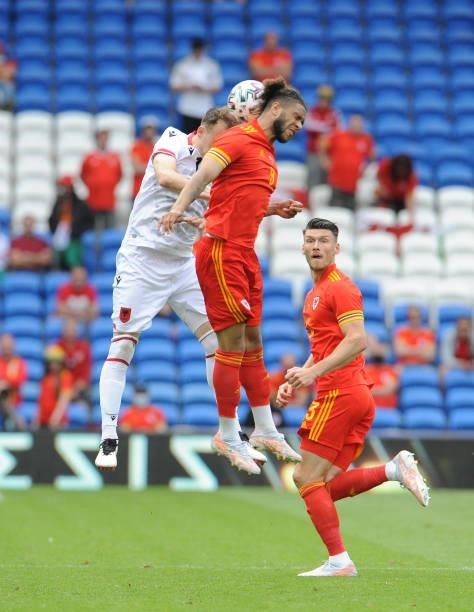 Wales Tyler Roberts and Albania's Bekim Balaj challenge for the header during the International friendly match between Wales and Albania at Cardiff...