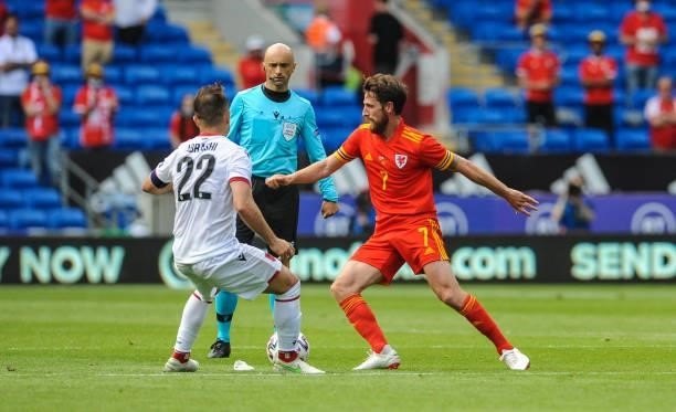 Wales Joe Allen is closed down by Albania's Amir Abrashi during the International friendly match between Wales and Albania at Cardiff City Stadium on...