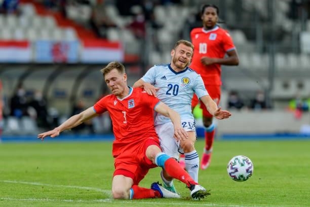 Enes Mahmutovic of Luxemburg and Ryan Fraser of Scotland battle for the ball during the international friendly match between Luxembourg and Scotland...