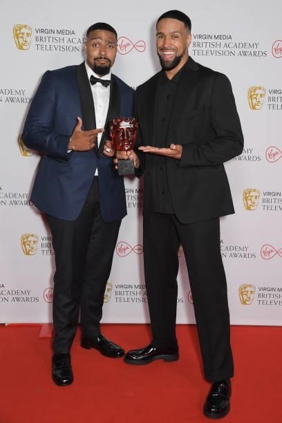 Jordan Banjo and Ashley Banjo, accepting Virgin Medias Must-See Moment award for Diversity's performance on "Britain's Got Talent", pose in the...