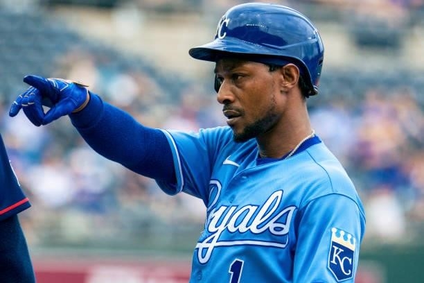 Jarrod Dyson of the Kansas City Royals points at the dugout after connecting with a Minnesota Twins pitch in the second inning at Kauffman Stadium on...