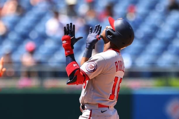 Victor Robles of the Washington Nationals reacts after hitting an RBI double against the Philadelphia Phillies during the fourth inning of a game at...