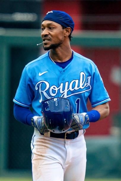 Jarrod Dyson of the Kansas City Royals dejectedly walks off the field after the Minnesota Twins completed a triple play in the first inning at...