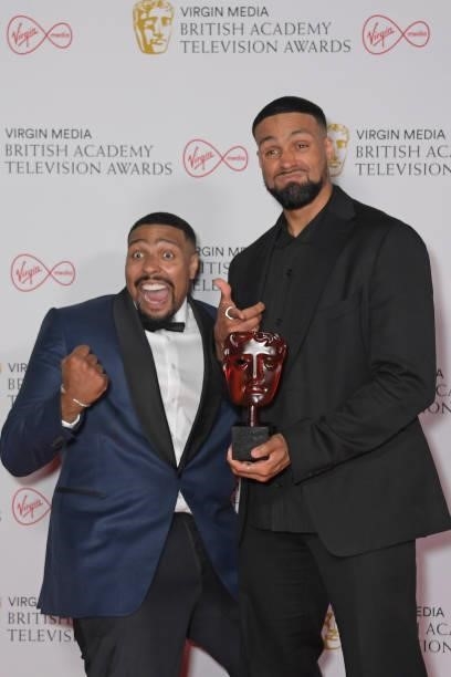 Jordan Banjo and Ashley Banjo, accepting Virgin Medias Must-See Moment award for Diversity's performance on "Britain's Got Talent", pose in the...