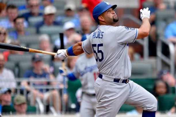 Albert Pujols of the Los Angeles Dodgers makes a base hit in the top of the 4th inning against the Atlanta Braves at Truist Park on June 6, 2021 in...