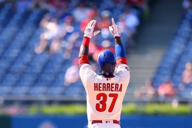 Odubel Herrera of the Philadelphia Phillies reacts after hitting a double during the sixth inning of a game against the Washington Nationals at...
