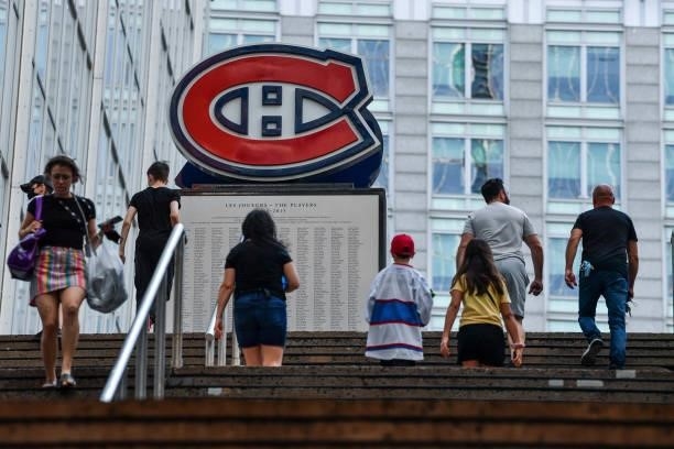 Fans make their way to the arena prior to the game between the Montreal Canadiens and the Winnipeg Jets in Game Three of the Second Round of the 2021...