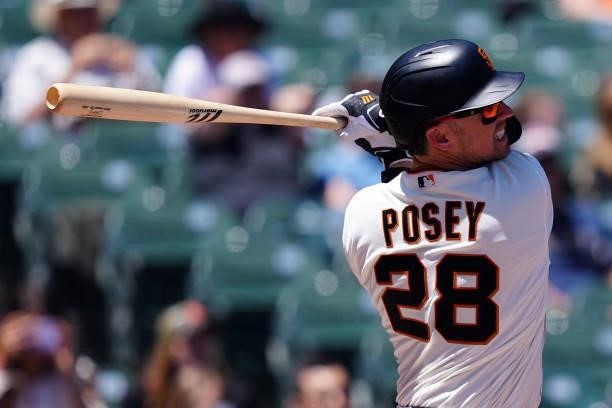 Buster Posey of the San Francisco Giants hits a double during the game between the Chicago Cubs and the San Francisco Giants at Oracle Park on...