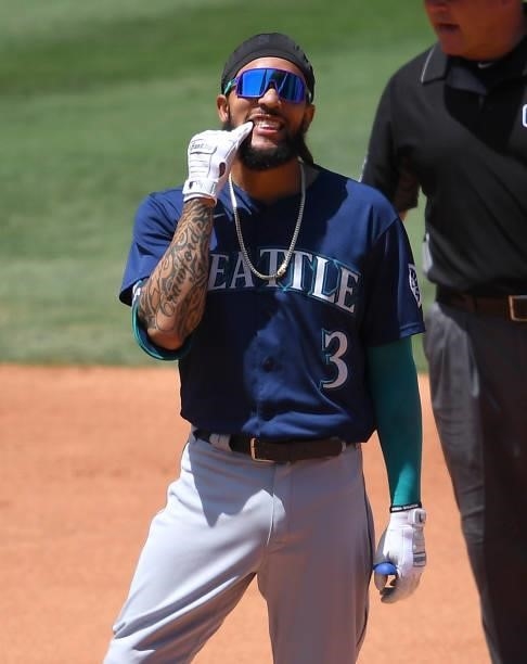 Crawford of the Seattle Mariners smiles as he stands on second after hitting a double in the third inning of the game against the Los Angeles Angels...