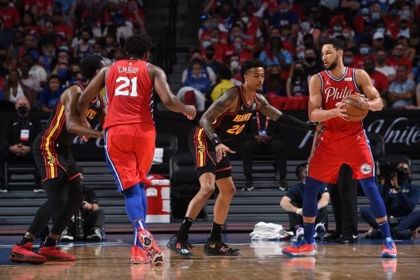 Ben Simmons of the Philadelphia 76ers handles the ball against John Collins of the Atlanta Hawks during Round 2, Game 1 of the Eastern Conference...