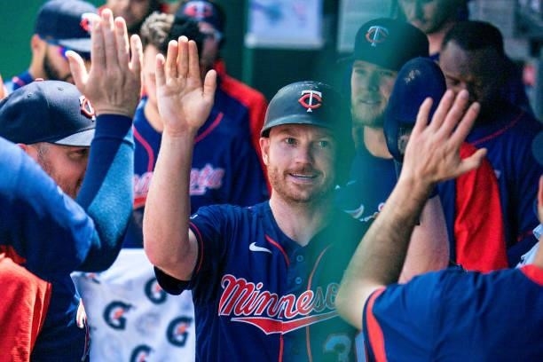 Kyle Garlick of the Minnesota Twins celebrates scoring a run against the Kansas City Royals in the fifth inning at Kauffman Stadium on June 6, 2021...