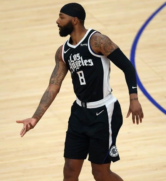 Marcus Morris Sr. #8 of the Los Angeles Clippers celebrates after scoring a three point basket against the Dallas Mavericks during the first half of...