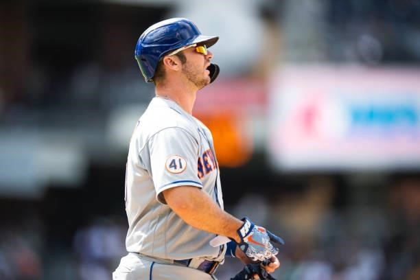 Pete Alonso of the New York Mets walks to first base after being hit by a pitch in the eighth inning against the San Diego Padres at Petco Park on...