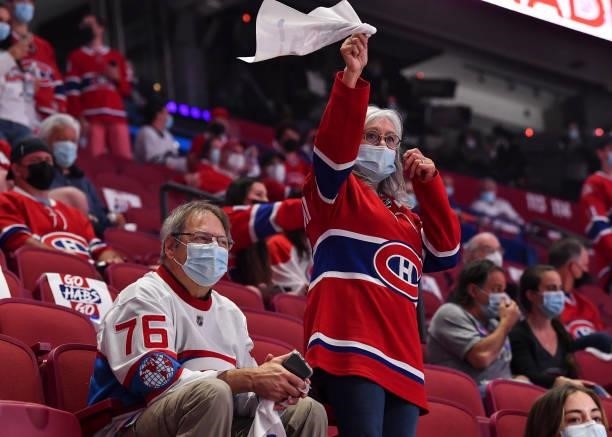 Fans watch warm-ups before action between the Montreal Canadiens and the Winnipeg Jets in Game Three of the Second Round of the 2021 Stanley Cup...