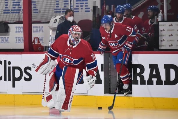 Carey Price of the Montreal Canadiens leads the team onto the ice prior to Game Three of the Second Round of the 2021 Stanley Cup Playoffs against...