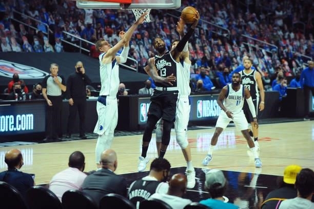 Paul George of the LA Clippers shoots the ball against the Dallas Mavericks during Round 1, Game 7 of the 2021 NBA Playoffs on June 6, 2021 at...
