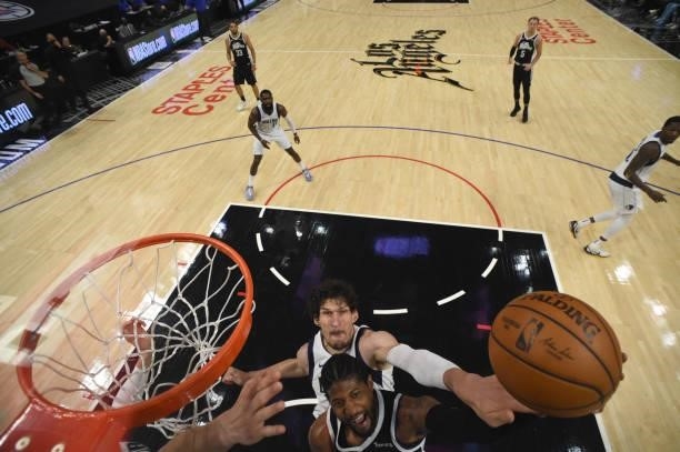 Boban Marjanovic of the Dallas Mavericks blocks the shot of Paul George of the LA Clippers during Round 1, Game 7 of the 2021 NBA Playoffs on June 6,...