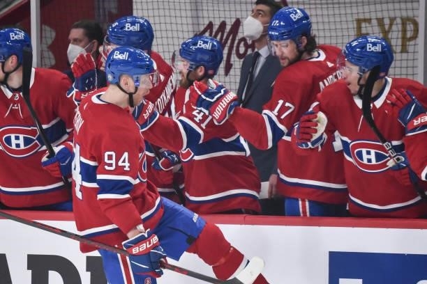 Corey Perry of the Montreal Canadiens celebrates his goal with teammates on the bench against the Winnipeg Jets during the first period in Game Three...