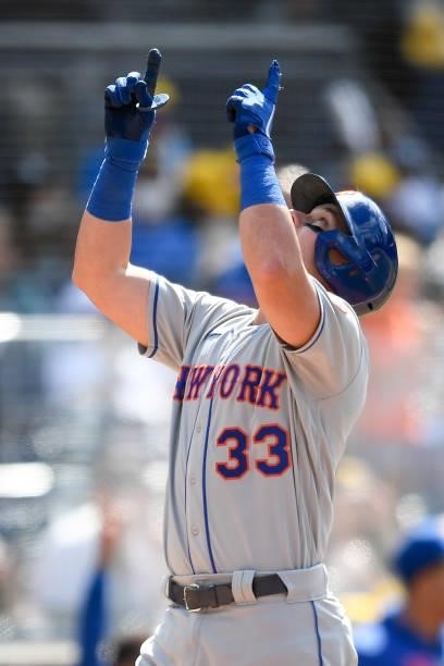 James McCann of the New York Mets points skyward after hitting a two-run home run in the eighth inning against San Diego Padres at Petco Park on June...