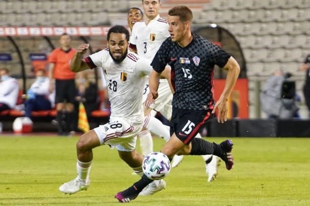 Mario Pasalic of Croatia is challenged by Jason Denayer of Belgium during the international friendly match between Belgium and Croatia at King...