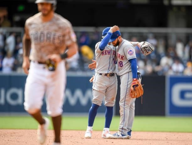 Francisco Lindor and Jose Peraza of the New York Mets embrace following a 6-2 win over the San Diego Padres at Petco Park on June 6, 2021 in San...