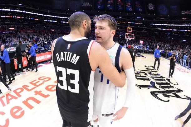 Nicolas Batum of the LA Clippers and Luka Doncic of the Dallas Mavericks embrace after the game during Round 1, Game 7 of the 2021 NBA Playoffs on...