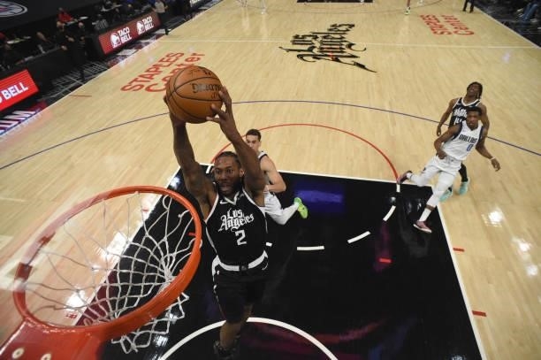 Kawhi Leonard of the LA Clippers dunks the ball against the Dallas Mavericks during Round 1, Game 7 of the 2021 NBA Playoffs on June 6, 2021 at...