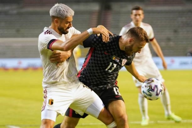 Yannick Carrasco of Belgium competes for the ball with Nikola Vlasic of Croatia during the international friendly match between Belgium and Croatia...