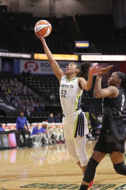 Tyasha Harris of the Dallas Wings drives to the basket against the Seattle Storm on June 6, 2021 at the Angel of the Winds Arena in Everett,...