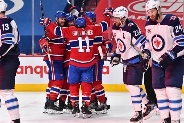 Brendan Gallagher, Shea Weber, Phillip Danault and Ben Chiarot celebrate a goal by teammate Artturi Lehkonen of the Montreal Canadiens against the...