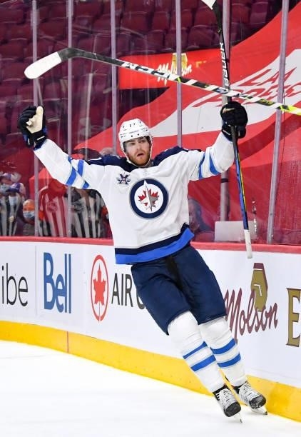 June 6: Adam Lowry of the Winnipeg Jets celebrates after scoring a goal against the Montreal Canadiens in Game Three of the Second Round of the 2021...