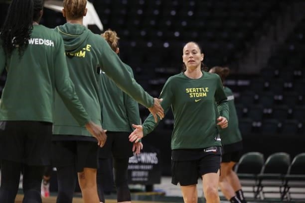 Sue Bird of the Seattle Storm high fives her teammates before the game against the Dallas Wings on June 6, 2021 at the Angel of the Winds Arena in...