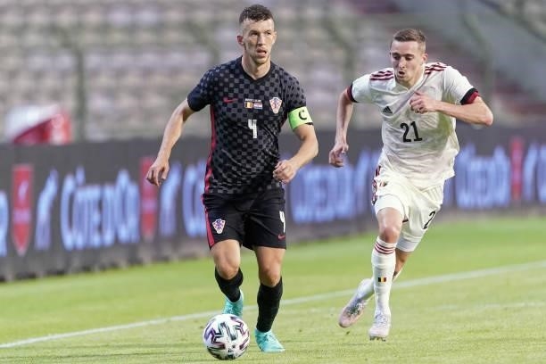 Ivan Perisic of Croatia is challenged by Timothy Castagne of Belgium during the international friendly match between Belgium and Croatia at King...
