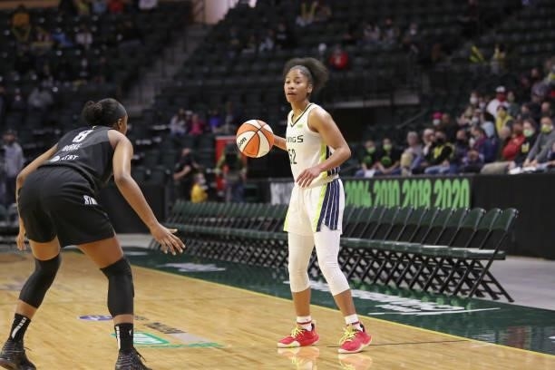 Tyasha Harris of the Dallas Wings handles the ball against the Seattle Storm on June 6, 2021 at the Angel of the Winds Arena in Everett, Washington....