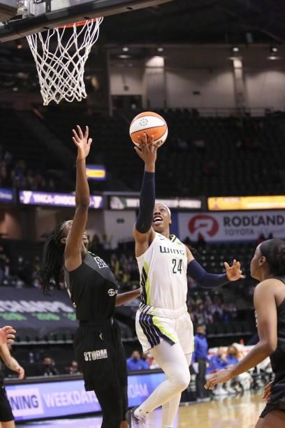Arike Ogunbowale of the Dallas Wings drives to the basket against the Seattle Storm on June 6, 2021 at the Angel of the Winds Arena in Everett,...