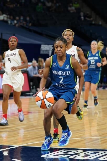 Crystal Dangerfield of the Minnesota Lynx drives to the basket during the game against the Atlanta Dream on June 6, 2021 at Target Center in...