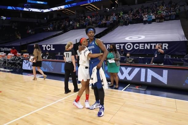 Odyssey Sims of the Atlanta Dream hugs Sylvia Fowles of the Minnesota Lynx after the game on June 6, 2021 at Target Center in Minneapolis, Minnesota....