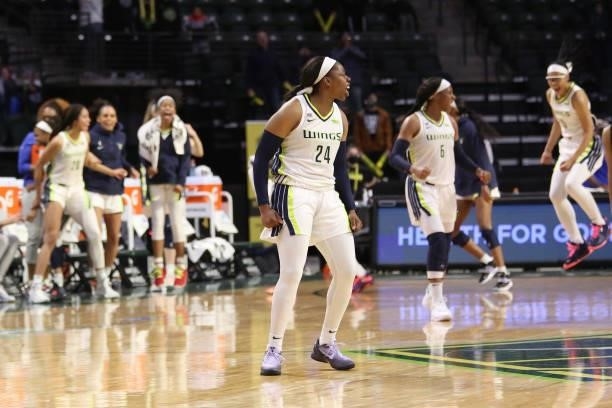 Arike Ogunbowale of the Dallas Wings celebrates after scoring a three point basket to win the game against the Seattle Storm on June 6, 2021 at the...