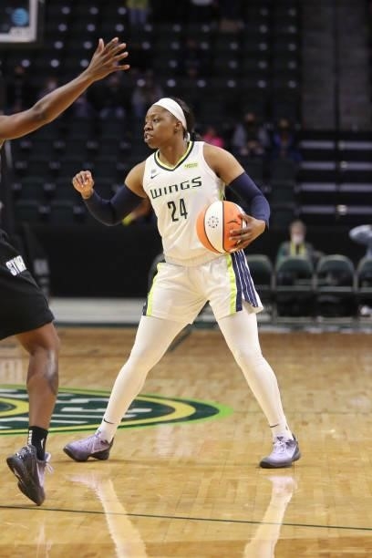 Arike Ogunbowale of the Dallas Wings handles the ball against the Seattle Storm on June 6, 2021 at the Angel of the Winds Arena in Everett,...