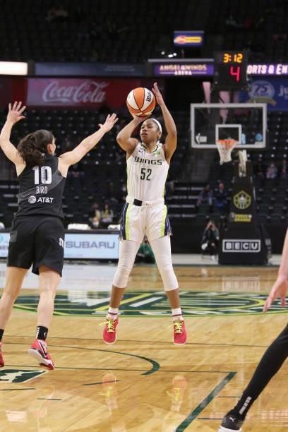 Tyasha Harris of the Dallas Wings shoots the ball against the Seattle Storm on June 6, 2021 at the Angel of the Winds Arena in Everett, Washington....