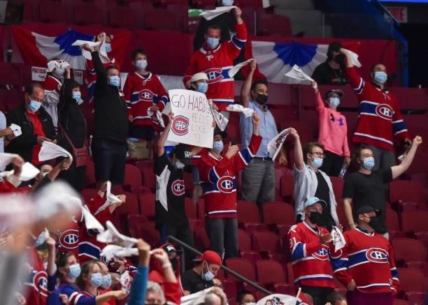Fans take in the atmosphere between the Montreal Canadiens and the Winnipeg Jets during the third period in Game Three of the Second Round of the...