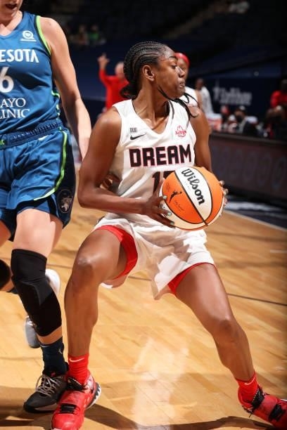 Tiffany Hayes of the Atlanta Dream drives to the basket against the Minnesota Lynx on June 6, 2021 at Target Center in Minneapolis, Minnesota. NOTE...