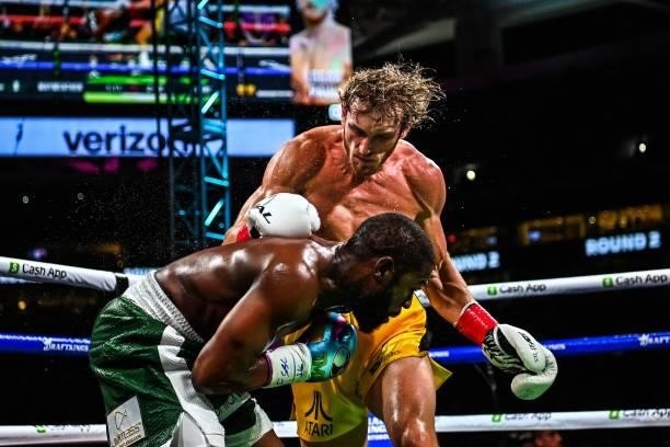 Former world welterweight king Floyd Mayweather and YouTube personality Logan Paul fight in an eight-round exhibition bout at Hard Rock Stadium in...