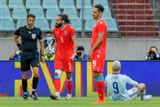 Referee Eldorjan Hamiti and Vahid Selimovic of Luxembourg discusses during the international friendly match between Luxembourg and Scotland at...