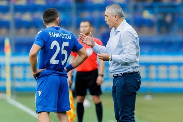 Nicolas Panaylotou of Cyprus and head coach Nikolaos Kostenoglou of Cyprus speaks with during the international friendly match between Ukraine and...