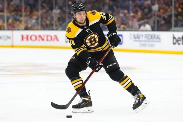 Charlie McAvoy of the Boston Bruins skates with the puck in Game Five of the Second Round of the 2021 Stanley Cup Playoffs against the New York...