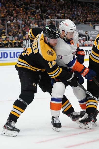 Chris Wagner of the Boston Bruins against Jordan Eberle of the New York Islanders in Game Five of the Second Round of the 2021 Stanley Cup Playoffs...