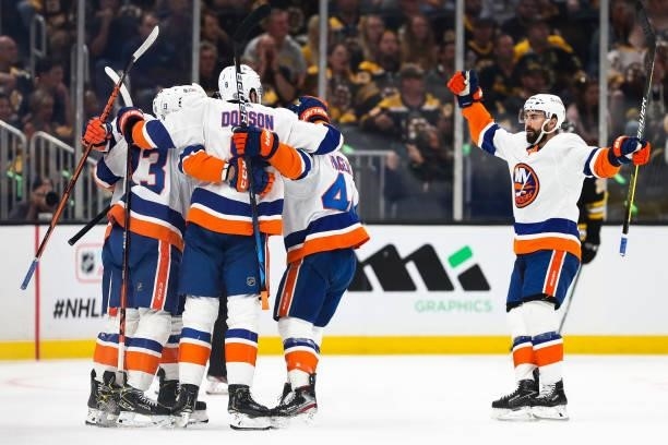 Mathew Barzal of the New York Islanders reacts with teammates after scoring in the first period in Game Five of the Second Round of the 2021 Stanley...