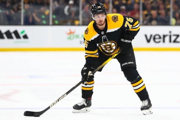 Connor Clifton of the Boston Bruins skates with the puck in Game Five of the Second Round of the 2021 Stanley Cup Playoffs against the New York...